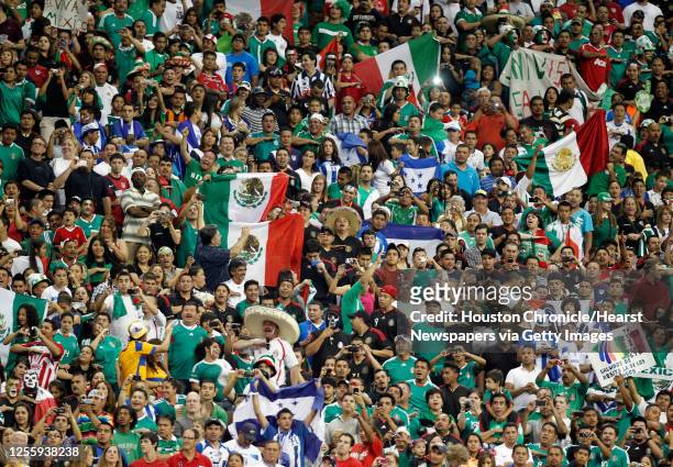 Mexican flags fill the staduim as Mexico plays Honduras during the CONCACAF Gold Cup 2011 semi-finals at Reliant Stadium Wednesday, June 22 in...