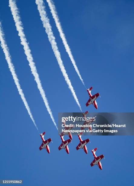 Part of the Canadian Forces Snowbirds during a flight demonstration during the 27th Annual Wings Over Houston Airshow at Ellington Airport Sunday,...