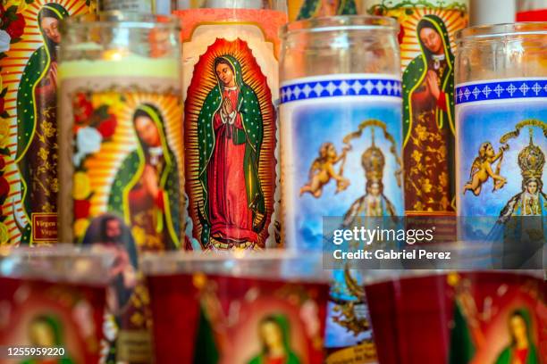 catholic prayer candles for our lady of guadalupe - virgin of guadalupe stockfoto's en -beelden