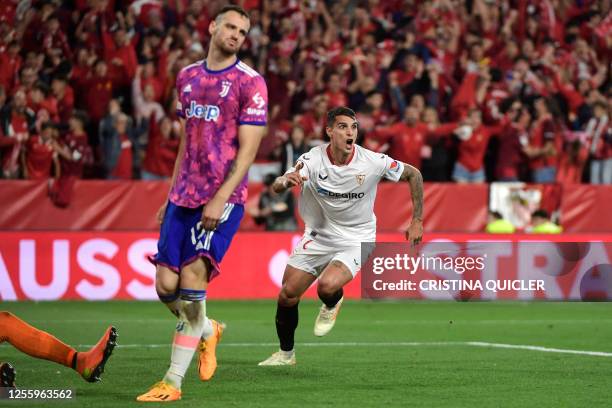 Sevilla's Argentinian forward Erik Lamela celebrates scoring his team's second goal during the UEFA Europa League semi-final second leg football...