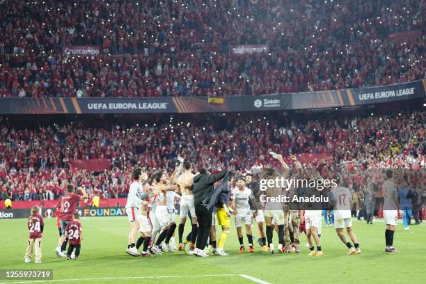 Sevilla players celebrate victory after the UEFA Europa League semi-final second leg match between Sevilla FC v Juventus at Estadio Ramon Sanchez...