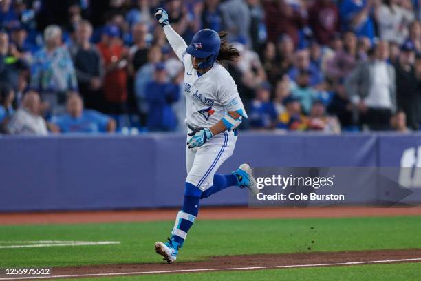 Bo Bichette of the Toronto Blue Jays runs out a solo home run in the first inning against the New York Yankees at Rogers Centre on May 18, 2023 in...