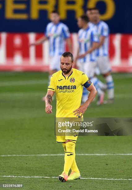 Santi Cazorla of Villarreal looks on after Diego Llorente of Real Sociedad scores the second goal during the Liga match between Villarreal CF and...