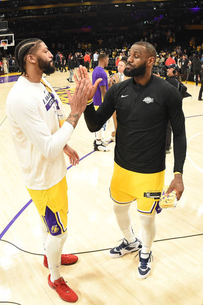 Anthony Davis of the Los Angeles Lakers talks with LeBron James of the Los Angeles Lakers after Game 6 of the Western Conference Semi-Finals 2023 NBA...
