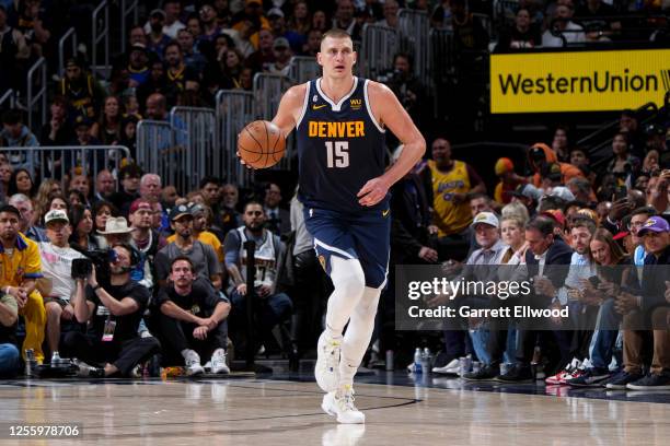 Nikola Jokic of the Denver Nuggets dribbles the ball during the game against the Los Angeles Lakers during Game 2 of the 2023 NBA Playoffs Western...