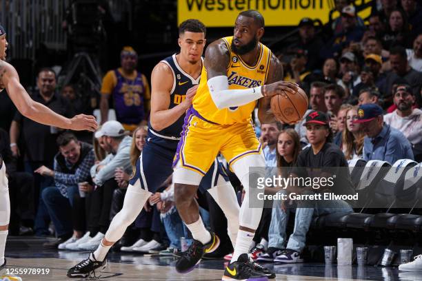 LeBron James of the Los Angeles Lakers dribbles the ball during the game against the Denver Nuggets during Game 2 of the 2023 NBA Playoffs Western...