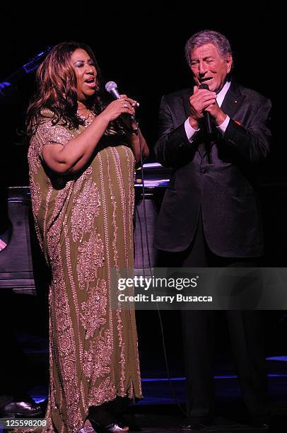 Aretha Franklin and Tony Bennett greet onstage during Tony Bennett's 85th Birthday Gala Benefit for Exploring the Arts at The Metropolitan Opera...