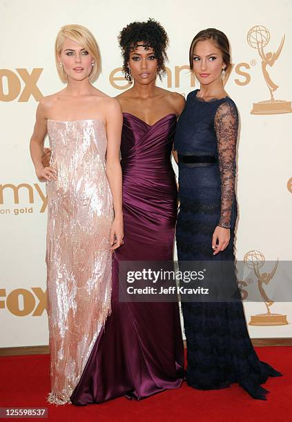 Actors L-R) Rachael Taylor, Annie Ilonzeh and Minka Kelly arrives at the 63rd Primetime Emmy Awards at Nokia Theatre L.A. Live on September 18, 2011...