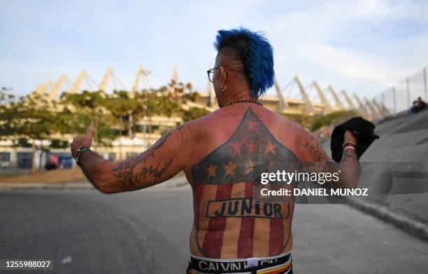 Fan of Junior shows his tattoos before a football match between Junior and Pereira at Metropolitano stadium in Barranquilla, Colombia on May 13,...