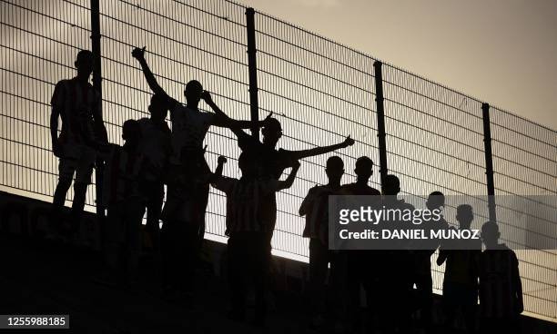 Fans of Junior wait before a football match between Junior and Pereira at Metropolitano stadium in Barranquilla, Colombia on May 13, 2023. In the...