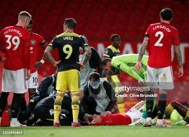 Brandon Williams of Manchester United receives medical treatment during the Premier League match between Manchester United and Southampton FC at Old...