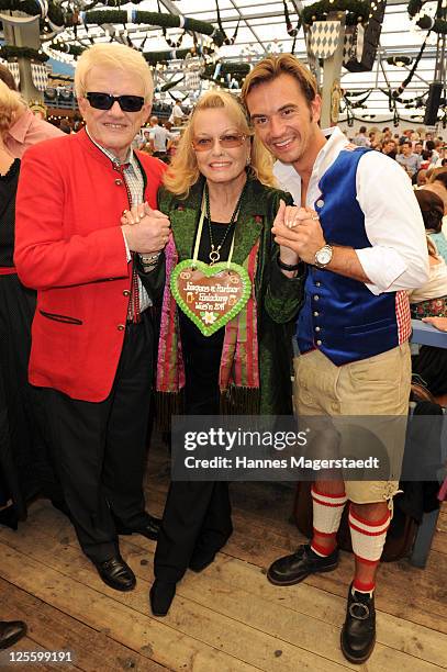 Heino Kramm and his wife Hannelore Auersperg and Florian Silbereisen attend the Oktoberfest beer festival at Schottenhamel beer tent on September 17,...