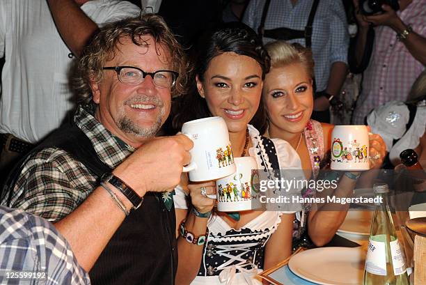 Martin Krug, Verona Pooth and Verena Kerth attend attend the Oktoberfest beer festival at Kaefer Schaenke beer tent on September 17, 2011 in Munich,...