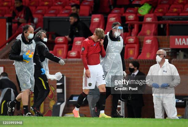 Brandon Williams of Manchester United receives medical treatment during the Premier League match between Manchester United and Southampton FC at Old...