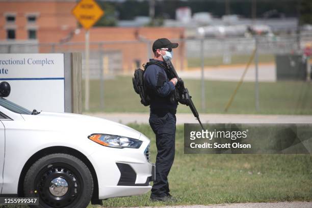 Security mans a road block at the Federal Correctional Complex where Daniel Lewis Lee is scheduled to be executed on July 13, 2020 in Terre Haute,...