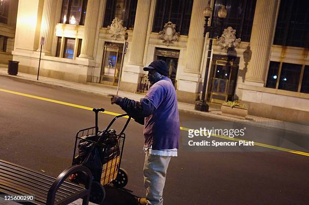 Reggie, a homeless man, walks the streets on September 18, 2011 in Bridgeport, Connecticut. Despite some of the poorest cities in the country,...
