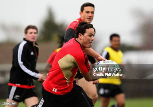 Zac Guildford of the All Blacks runs the ball during a New Zealand All Blacks IRB Rugby World Cup 2011 training session at Linfield Park on September...