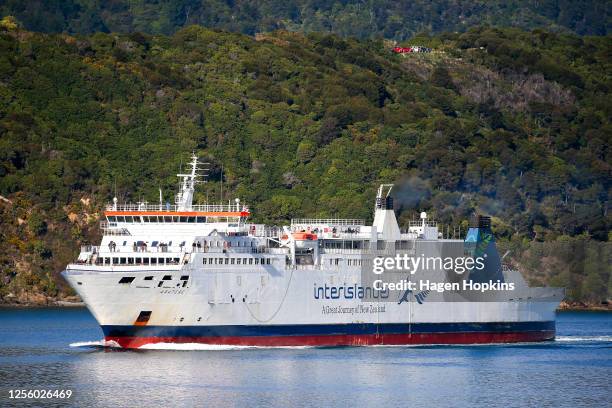 An Interislander ferry sails through Marlborough Sounds on July 14, 2020 in Picton, New Zealand. With international borders still closed due to the...