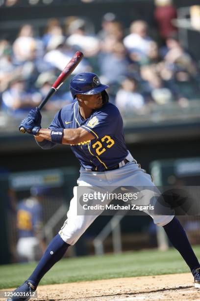 February 24: Keon Broxton of the Milwaukee Brewers bats during the game against the Oakland Athletics at Hohokam Stadium on February 24, 2020 in...