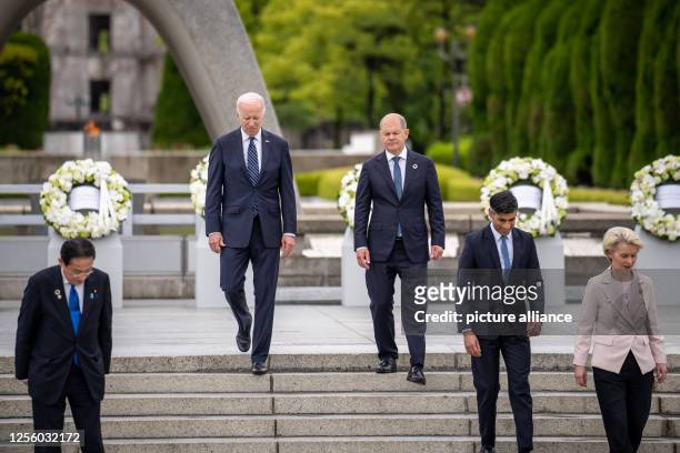 May 2023, Japan, Hiroshima: Fumio Kishida, Prime Minister of Japan, Joe Biden, President of the United States, German Chancellor Olaf Scholz , Rishi...