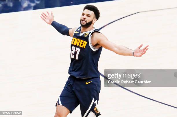 Denver Nuggets guard Jamal Murray celebrates after making a three-point basket during the second half of game two in the NBA Playoffs Western...