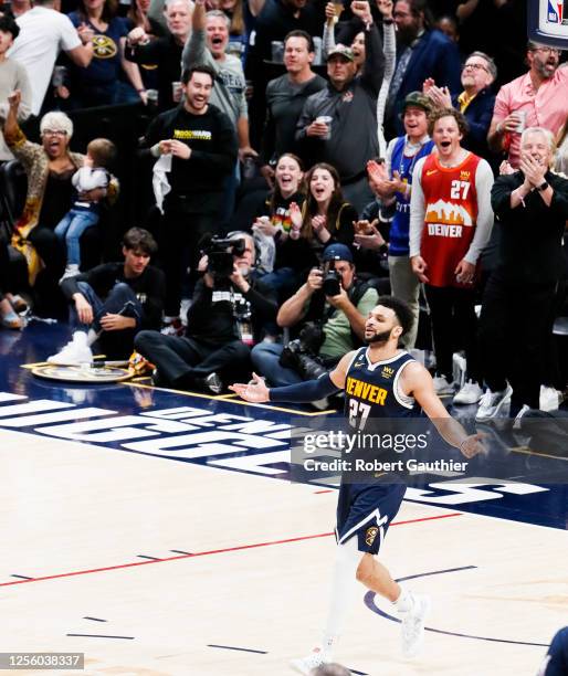 Denver Nuggets guard Jamal Murray celebrates his three-point shot during the second half of game two in the NBA Playoffs Western Conference Finals...