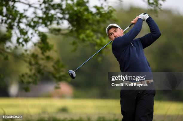 Paul Dunne of Ireland tees off at the second hole during Day One of the B-NL Challenge Trophy at Twentsch Golf Club on May 18, 2023 in Delden,...