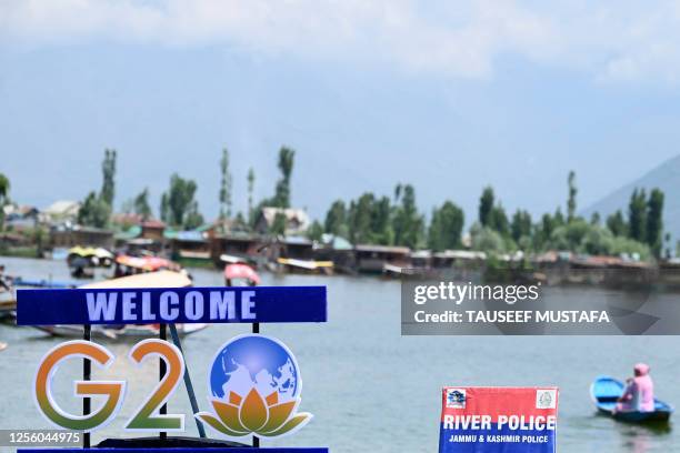 Logo is pictured on a boat in Dal Lake ahead of the G20 meeting in Srinagar on May 19, 2023.