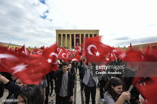 People wave Turkish flags as Turkish Minister of Youth and Sports, Mehmet Muharrem Kasapoglu visits Anitkabir, the mausoleum of Turkiye's founder...