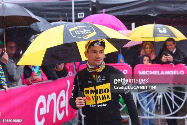 Jumbo-Visma's Slovenian rider Primoz Roglic arrives for the presentation of the teams, prior to the thirteenth stage of the Giro d'Italia 2023...