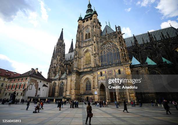 People visit St. Vitus Cathedral located at Prague Castle which is the largest ancient castle in the world, in Prague, Czechia on April 16, 2023....