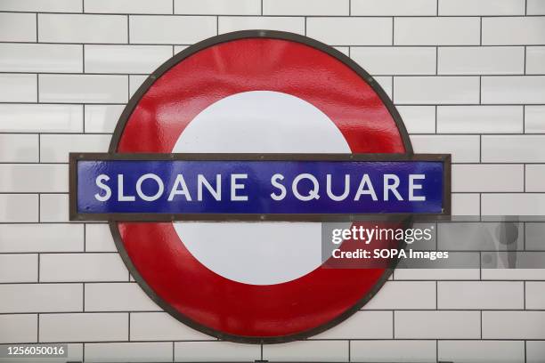 Sloane Square sign displayed at the London underground station.