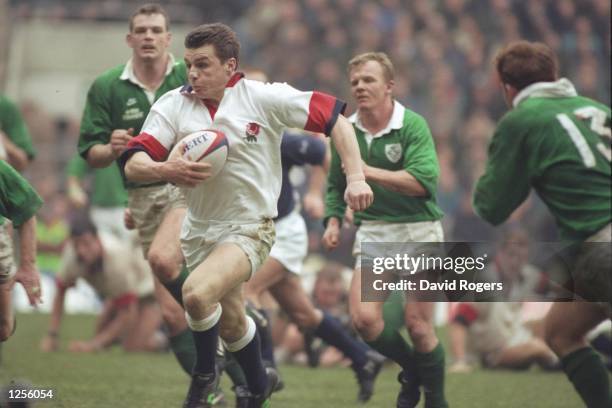 Jon Sleightholme of England carves up the Irish defence on his way to a try during the five nations international between England and Ireland at...