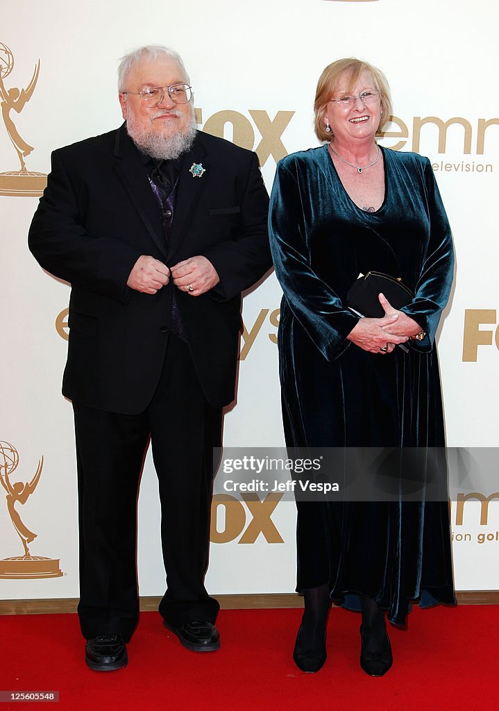 Author George R.R. Martin and wife Parris McBride arrive to the 63rd