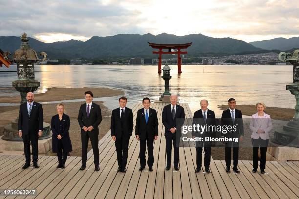 The Group of Seven leaders pose for photographs at the Itsukushima Shrine on Miyajima island on day one of the G-7 leaders summit in Hatsukaichi,...