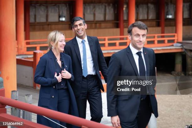 Leaders Italian Premier Giorgia Meloni, UK Prime Minister Rishi Sunak and French President Emmanuel Macron arrive for the family photo at the...