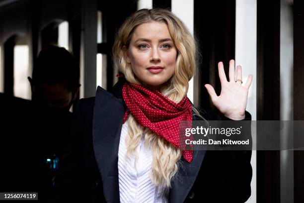 American Actress Amber Heard arrives at Royal Courts of Justice, Strand on July 14, 2020 in London, England. American actor Johnny Depp is taking...