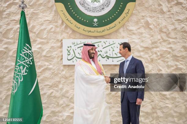 Saudi Arabian Crown Prince Mohammed bin Salman greets the head of Syrian regime Bashar Al Assad , ahead of the 32nd Arab League Summit in Jeddah,...