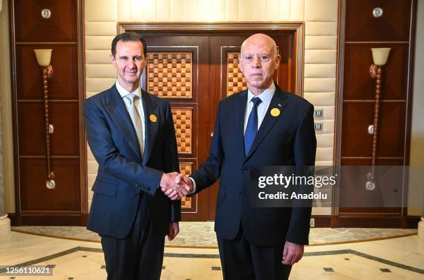 Tunisian President Kais Saied meets head of Syrian regime Bashar Al Assad within the 32nd Arab League Summit in Jeddah, Saudi Arabia on May 19, 2023.