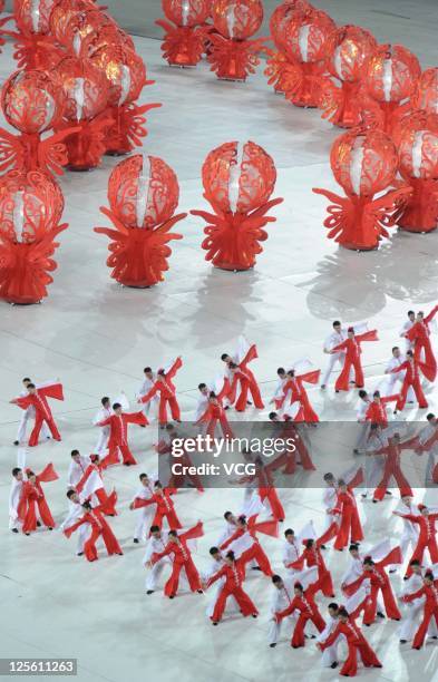 Dancers perform on the stage during the closing ceremony of the 9th National Traditional Games of Ethnic Minorities of the People's Republic of China...