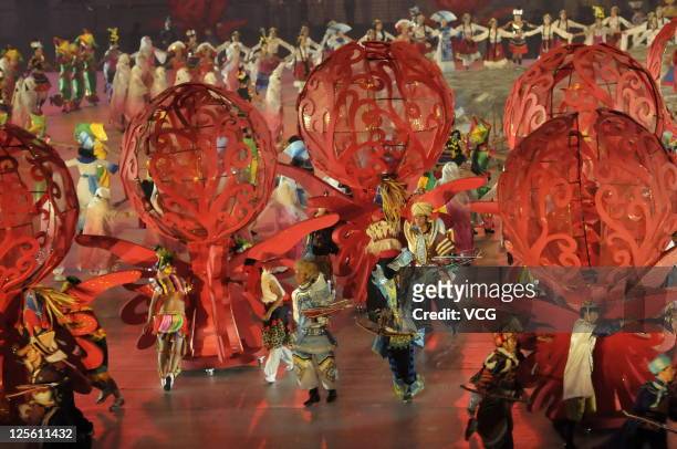 Dancers perform on the stage during the closing ceremony of the 9th National Traditional Games of Ethnic Minorities of the People's Republic of China...