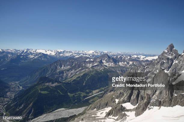 Alpine panorama during the ascent with the Skyway Monte Bianco cable car in the Alps that connects the Italian city of Courmayeur with Punta...