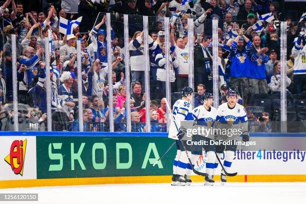 Atte Ohtamaa of Finland, Mikko Lehtonen of Finland and Mikko Rantanen of Finland celebrates after scoring during the 2023 IIHF Ice Hockey World...