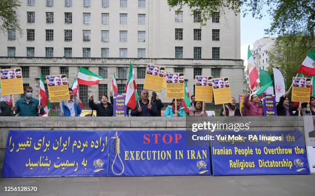 People protesting outside Downing Street in London about the recent spate of executions in Iran. Picture date: Friday May 19, 2023.