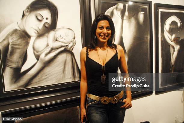 Pooja Bedi attends the Deeds Charitable art exhibition on June 10, 2009 in Mumbai, India.