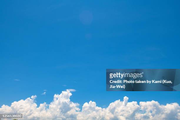 clean blue sye with cumulus clouds. - dark cloud stock pictures, royalty-free photos & images