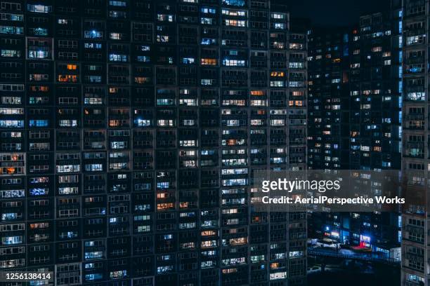 residential neighborhood residential building at night - blockchain energy stock pictures, royalty-free photos & images