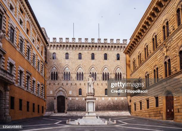 monte dei paschi di siena headquarter in siena city, tuscany, italy. - siena italy stock pictures, royalty-free photos & images