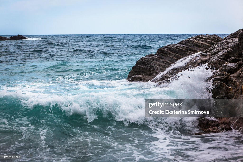 Pebble rocky beach of Ligurian sea, Cinque terre, Liguria, Italy