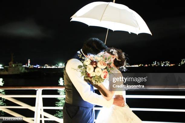 portrait of happy newlywed couple - first night of marriage stock pictures, royalty-free photos & images